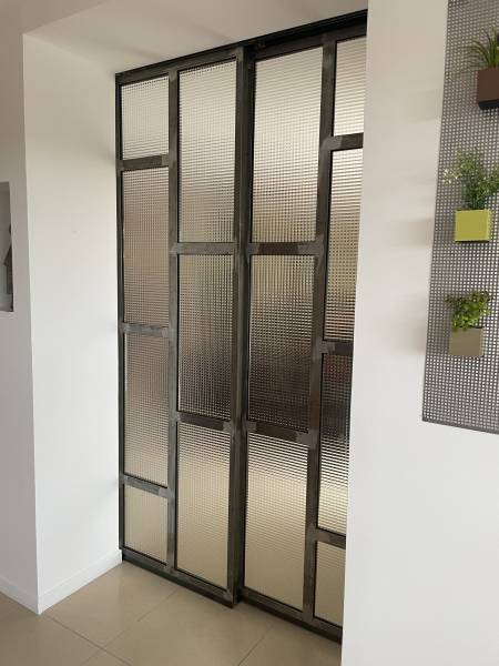 Fourniture et pose d'une porte vitrée coulissante à Pezenas proche de Béziers